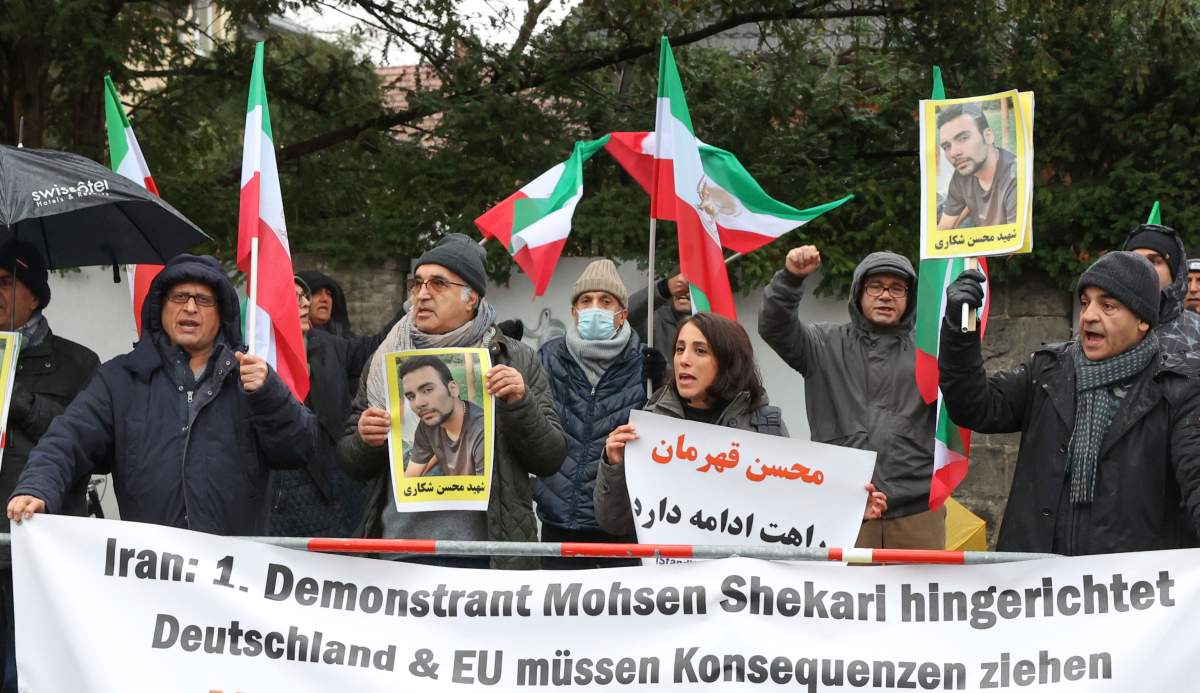 People protest in front of the Iranian embassy in Berlin, Germany, Thursday, Dec. 8, 2022 against the execution of Iranian Mohsen Shekari.