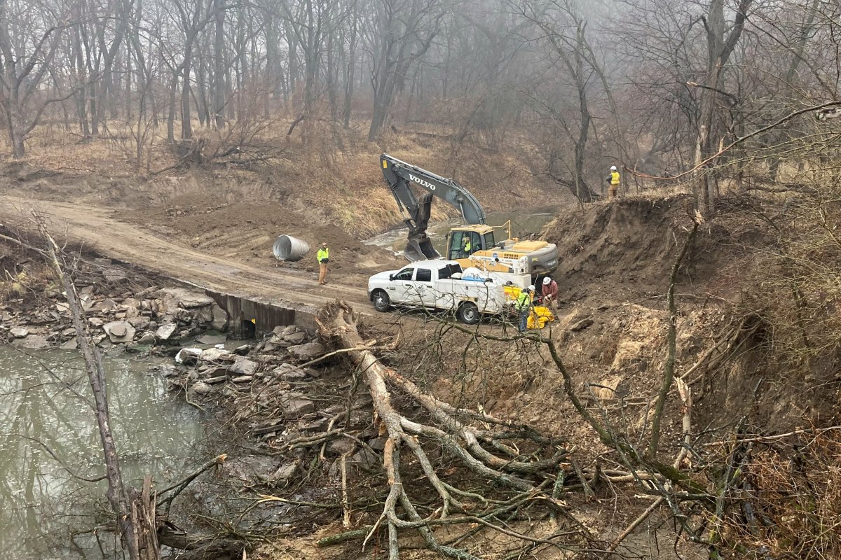 Washington County Road Department constructs an emergency dam to intercept an oil spill after a Keystone pipeline ruptured at Mill Creek in Washington County, Kanas, on Thursday, Dec 8, 2022.