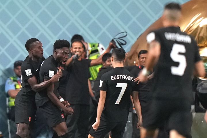 Canada forward Alphonso Davies, second from left, celebrates his goal against Croatia with teammates during first half group F World Cup soccer action at the Khalifa International Stadium in Al Rayyan, Qatar on Sunday, Nov. 27, 2022.