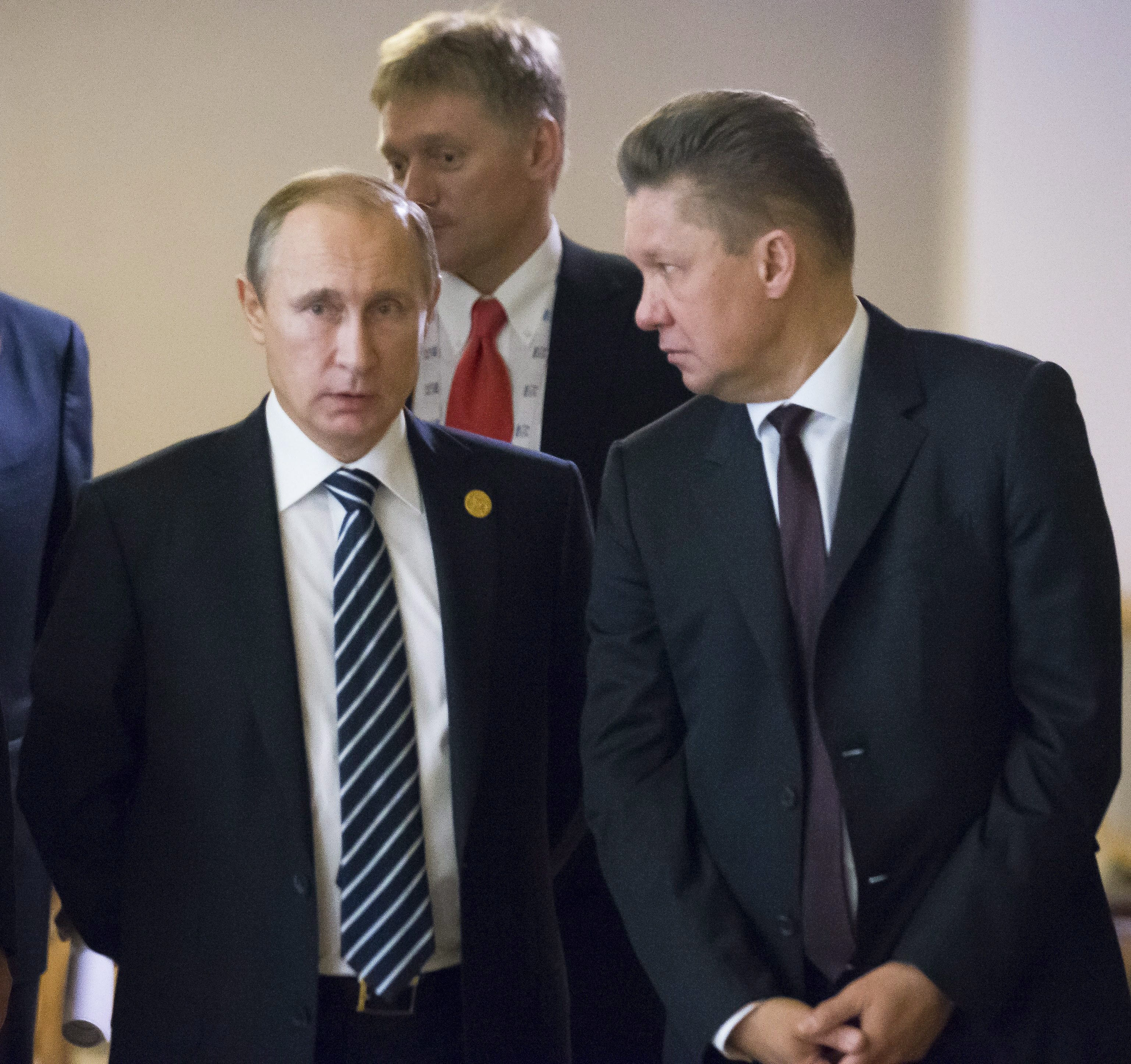 Russian President Vladimir Putin, left, with Alexey Miller, a Gazprombank board member, Nov. 16, 2015. (AP Photo/Alexander Zemlianichenko)