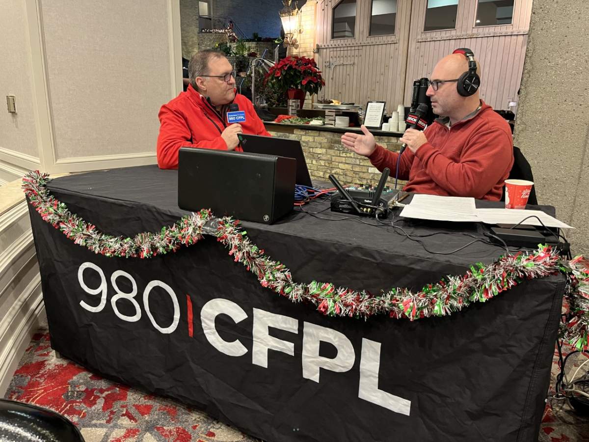 Glenn van Gulik, public relations director for the Ontario Salvation Army, speaking with 980 CFPL ‘The Morning Show’ host Devon Peacock at the annual Gift a Gift campaign in London, Ont., on Thursday, Dec. 8, 2022.