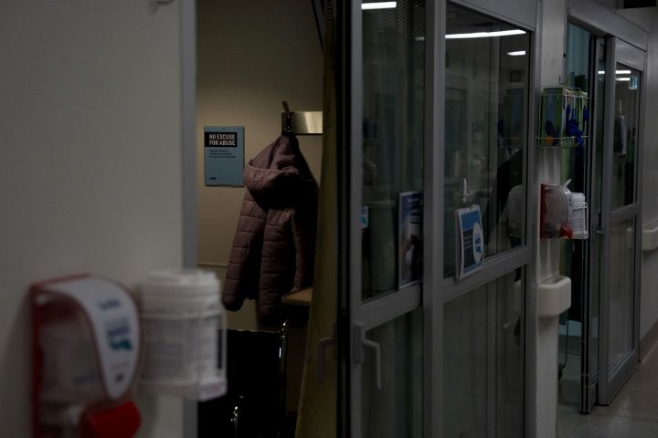 FILE PHOTO: A coat hangs in a treatment room In the emergency department at a children's hospital.