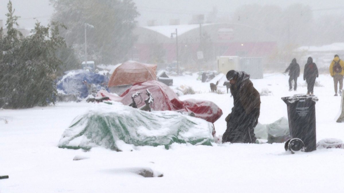 a pictures showing a homeless encampment located in Kelowna, BC. The city is dealing with a cold snap and trying to keep those more vulnerable warm and safe.