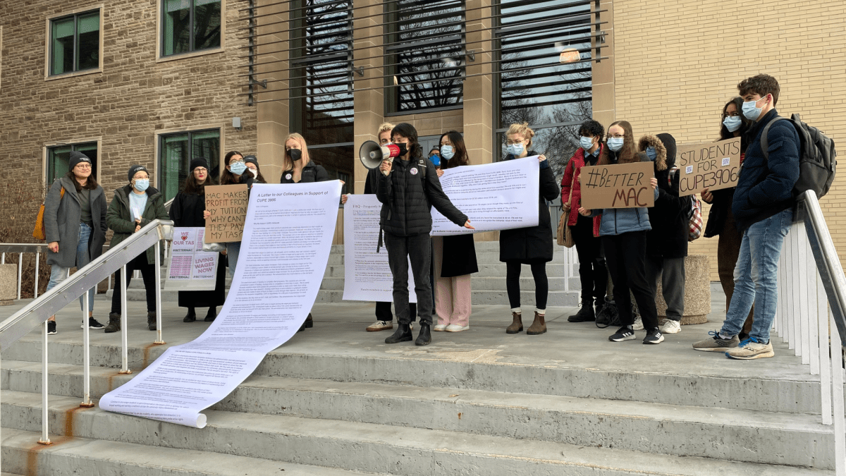 McMaster students showed off letters signed by more than 700 students and faculty on campus Dec. 8, 2022. The demonstators insist McMaster has enough money to improve the deal that’s currently on the table.