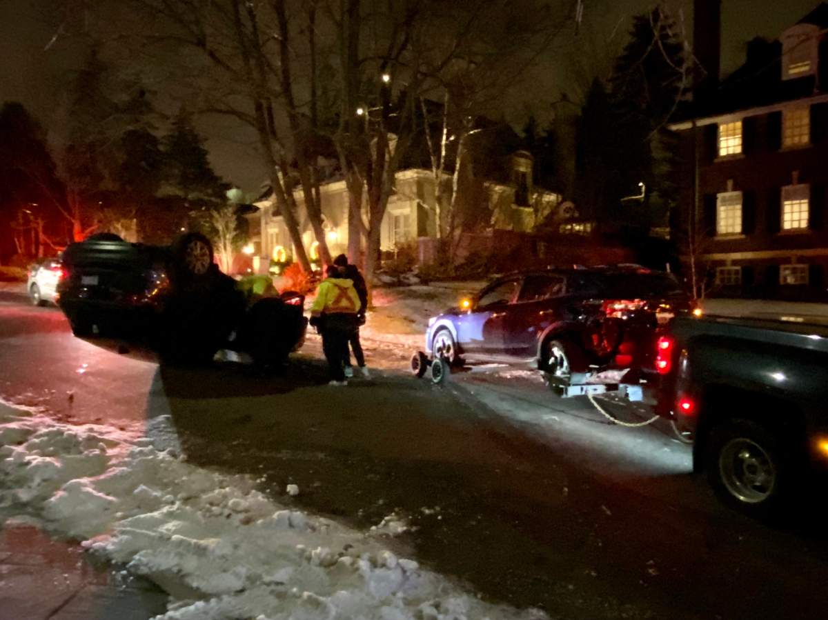 A woman has been taken to hospital after a vehicle flipped over in Toronto.