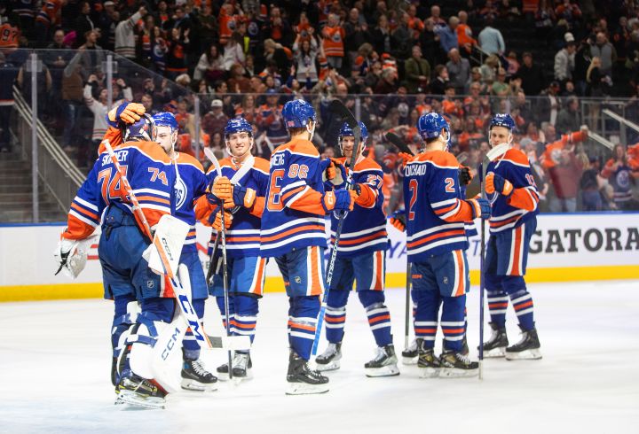 Edmonton Oilers players celebrate their win over the Minnesota Wild in NHL action in Edmonton on Friday, December 9, 2022.