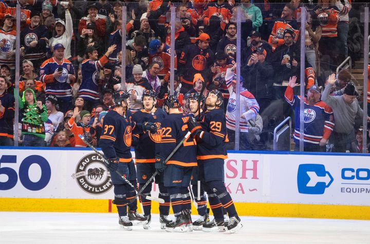 Edmonton Oilers players celebrate a goal against the Arizona Coyotes during first period NHL action in Edmonton on Wednesday, December 7, 2022.x