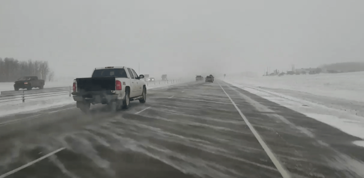 Blowing snow and poor visibility affecting drivers on the QEII Highway near Red Deer on Dec. 23, 2022.