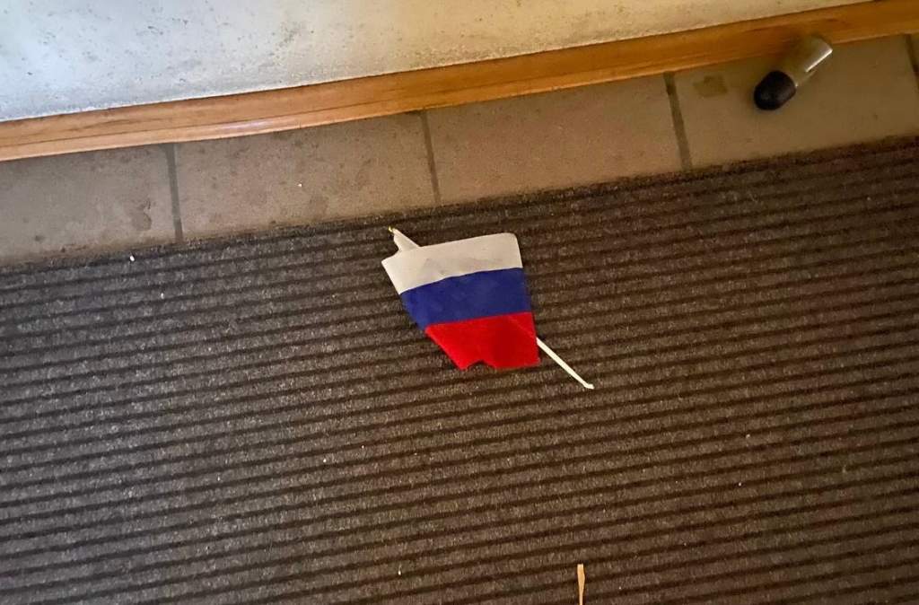 Russian flag on floor of prison used during occupation of Kherson.