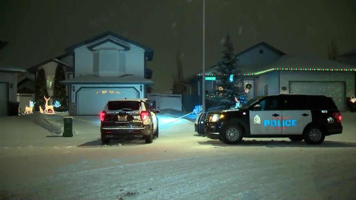 Edmonton Police Service vehicles at the home on the corner of 166a Avenue and 75a Street where Daniela Roman, 51, was found dead on December 15, 2022.