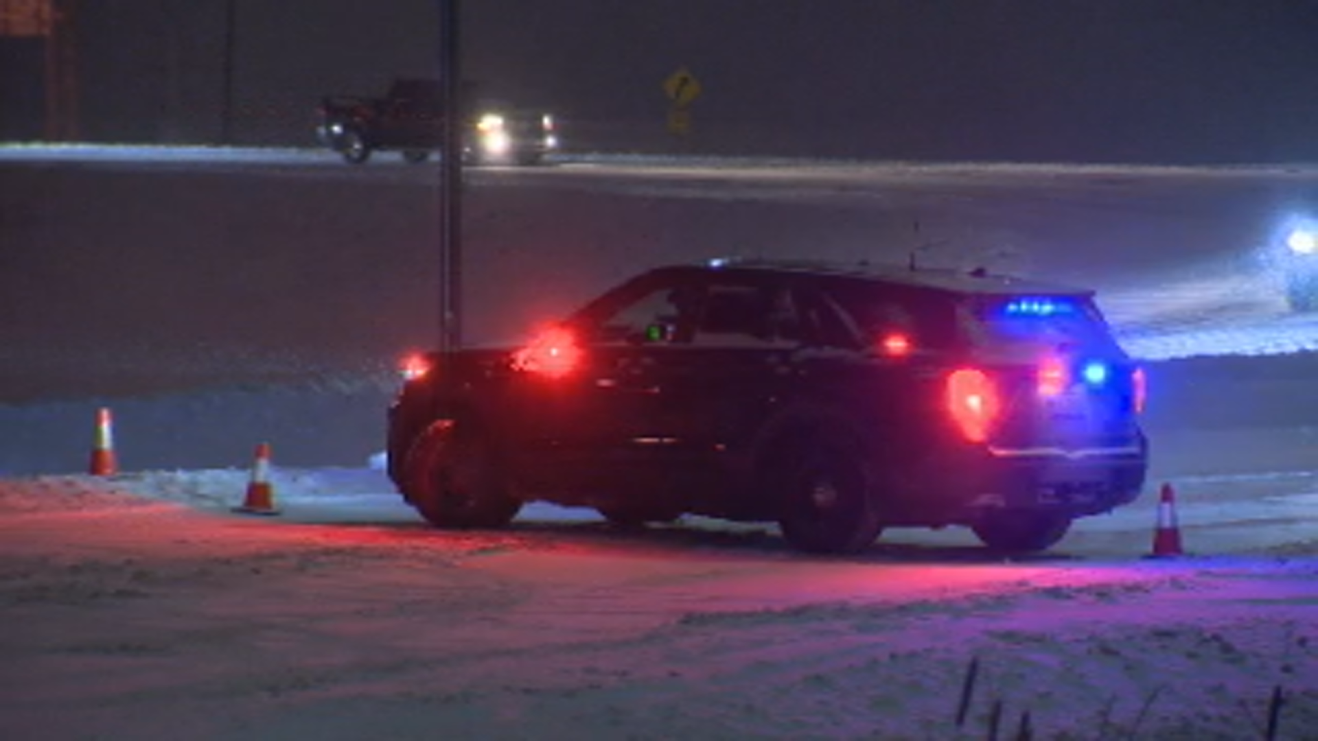 A police vehicle near the scene of a crash on the South Perimeter Monday night.