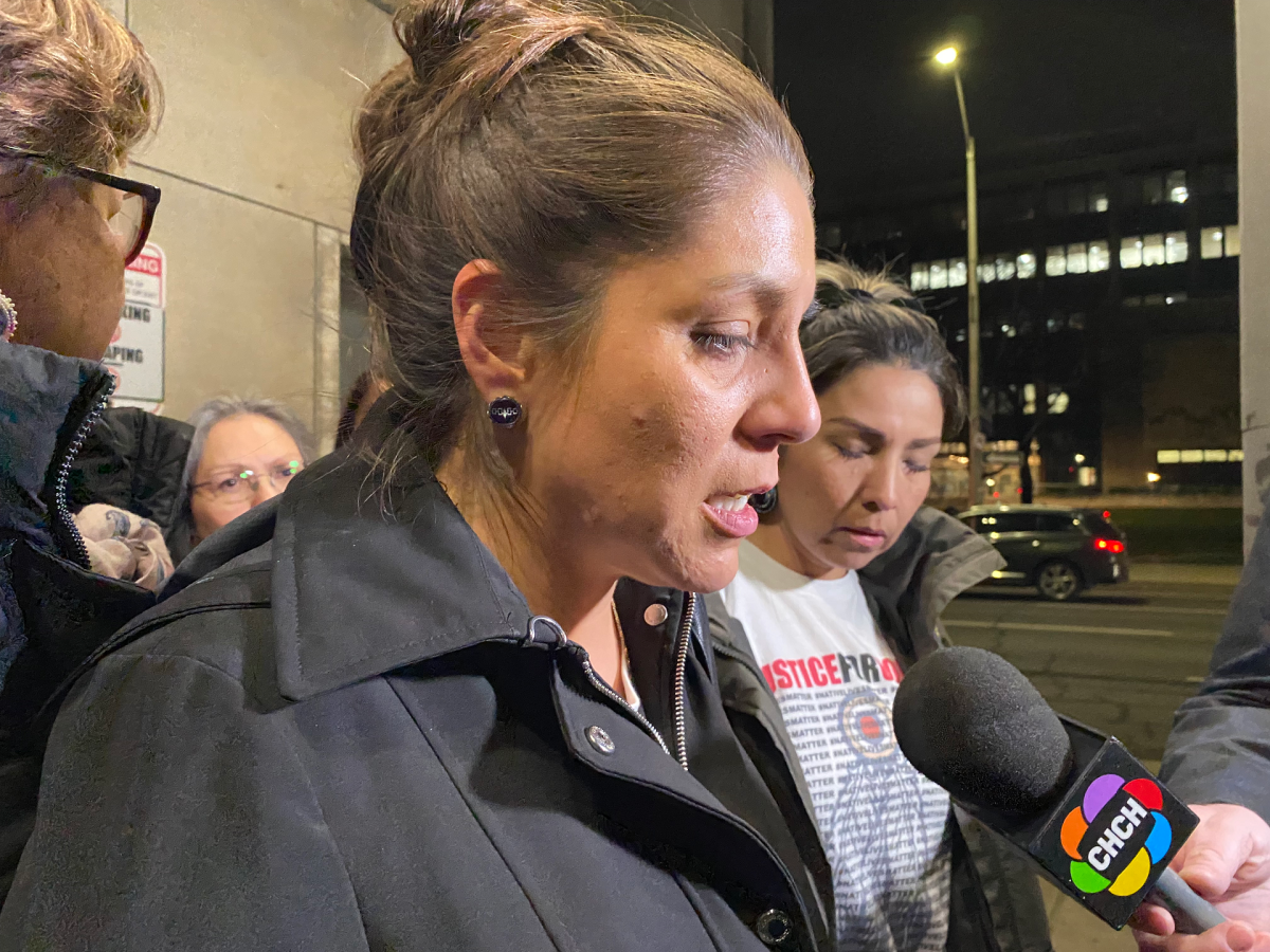 Jonathan Styres' partner Lindsay Hill addresses media after a jury found Peter Khill guilty of manslaughter in Styres' death.