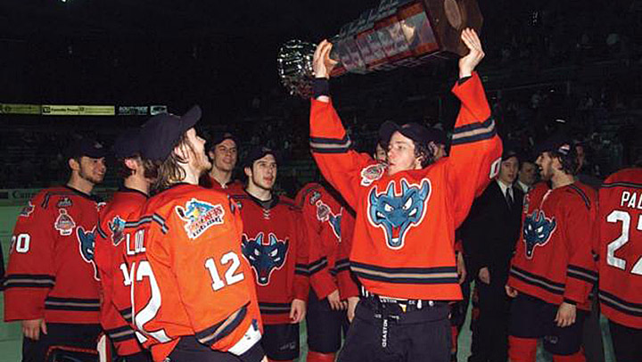 Duncan Keith hoists the WHL’s championship trophy after Kelowna defeated Red Deer 2-0 on May 10, 2003. Kelowna won the best-of-seven series 4-2.