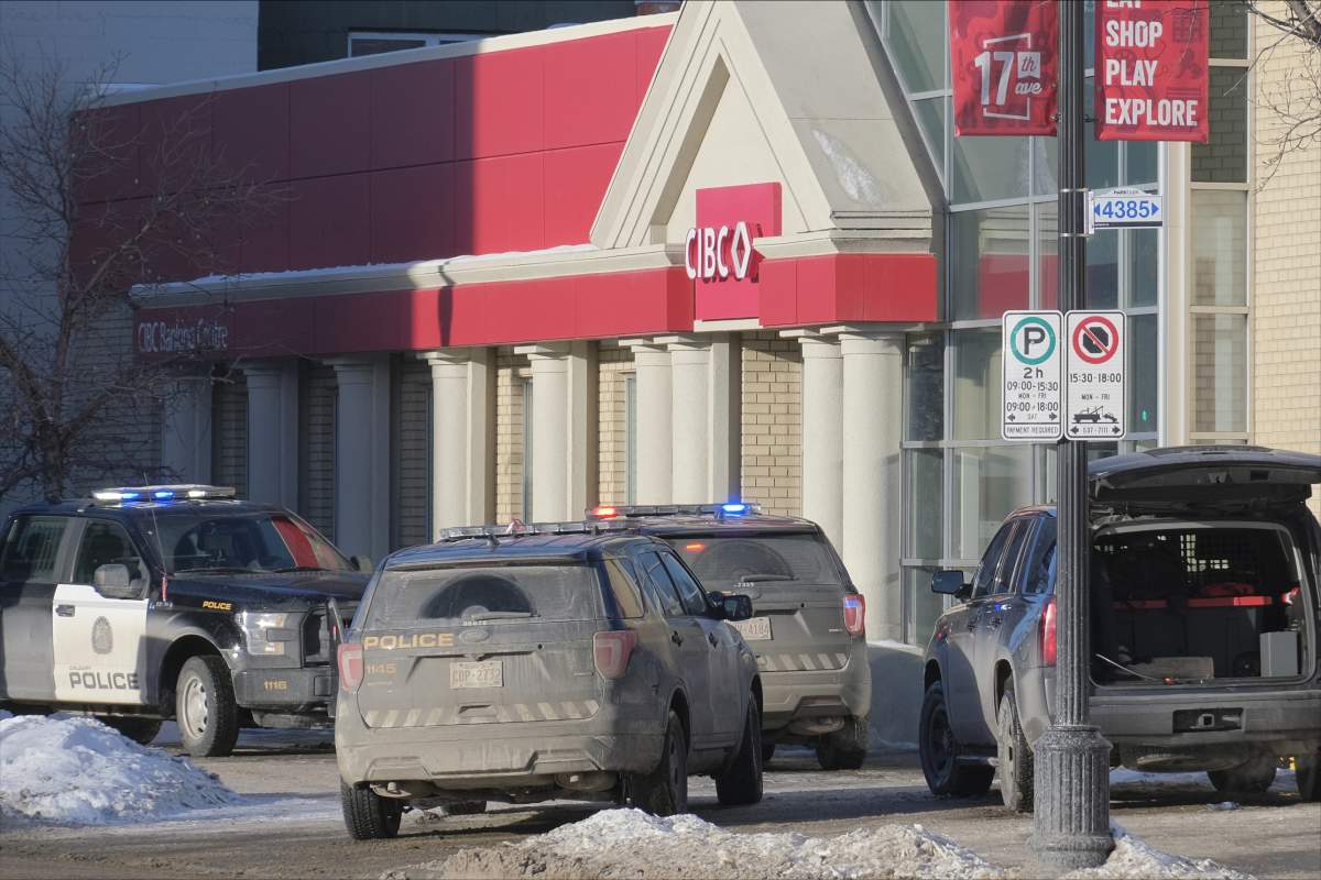 Calgary police attend a bank on 17 Avenue S.W. for what they called a "disturbance" on Dec. 9, 2022.