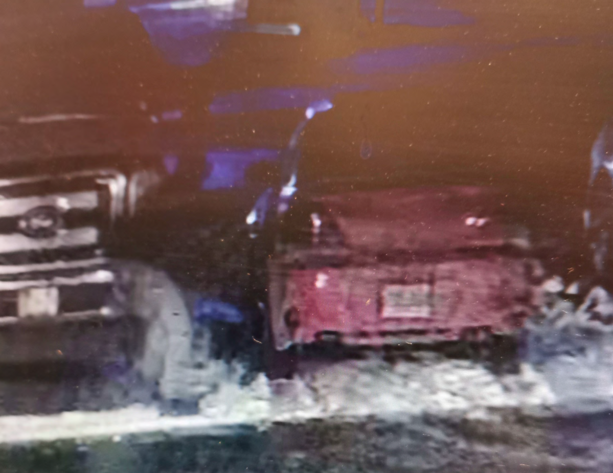 The suspect vehicle at the scene of a theft.