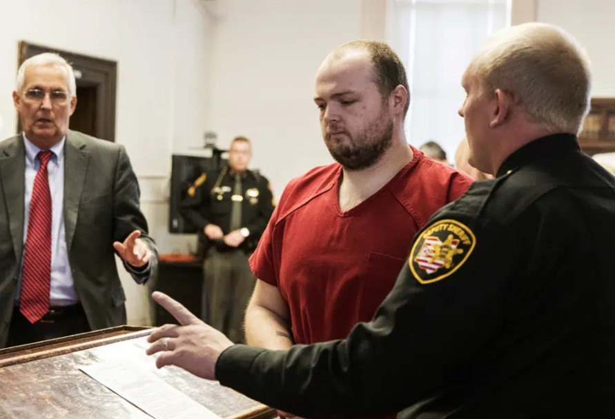 FILE - George Wagner IV, center, is escorted out of the courtroom after his arraignment on Nov. 28, 2018, at the Pike County Courthouse, in Waverly, Ohio. Walker, convicted in the killings of eight people from another southern Ohio family, faces the possibility of life in prison without parole when he is sentenced Monday, Dec. 19, 2022.