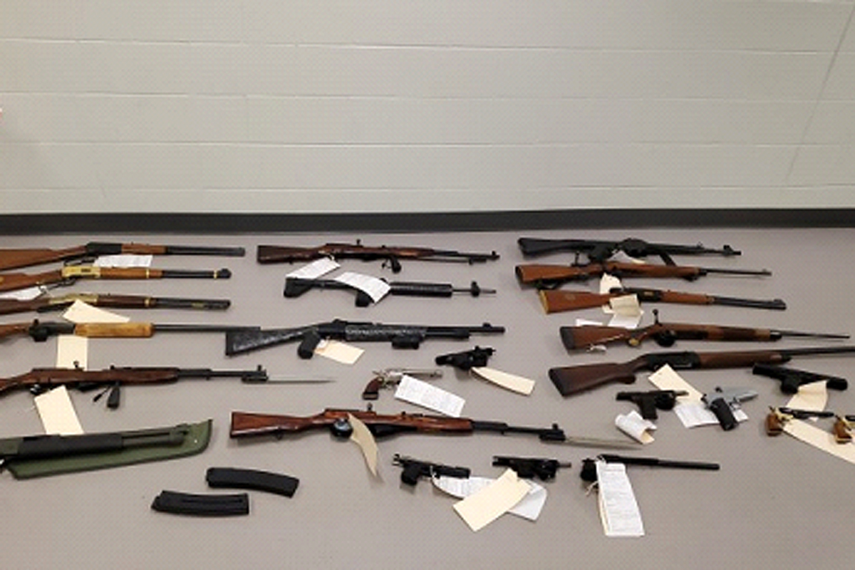 Waterloo regional police say the home was searched and officers found eight restricted firearms, 15 non-restricted firearms and ammunition.