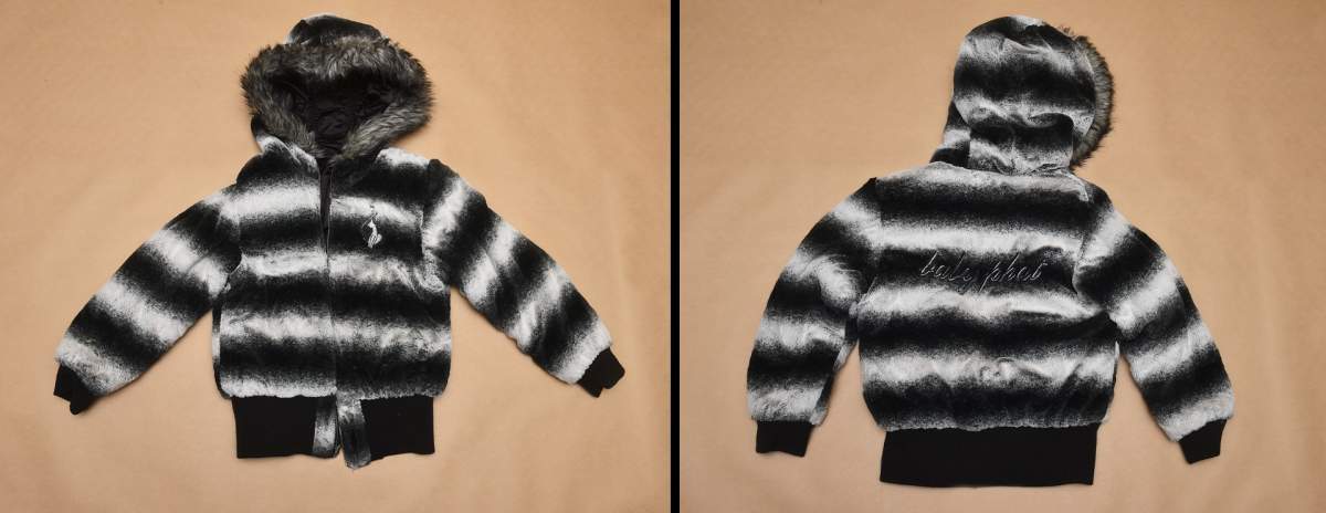 One side of a reversible jacket police believe an unidentified homicide victim wore.