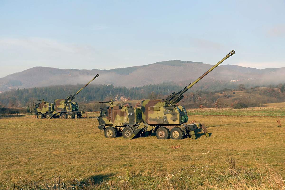 In this photo provided by the Serbian Defense Ministry Press Service, Serbian army self-propelled 155 mm gun-howitzers are seen on position near administrative line with Kosovo, south Serbia, Monday, Dec. 26, 2022. Kosovo remains a potential flashpoint in the Balkans years after the 1998-99 war that ended with NATO intervention. Serbia doesn’t recognize the 2008 declaration of independence of its former province, while Western efforts to mediate a solution so far have failed.