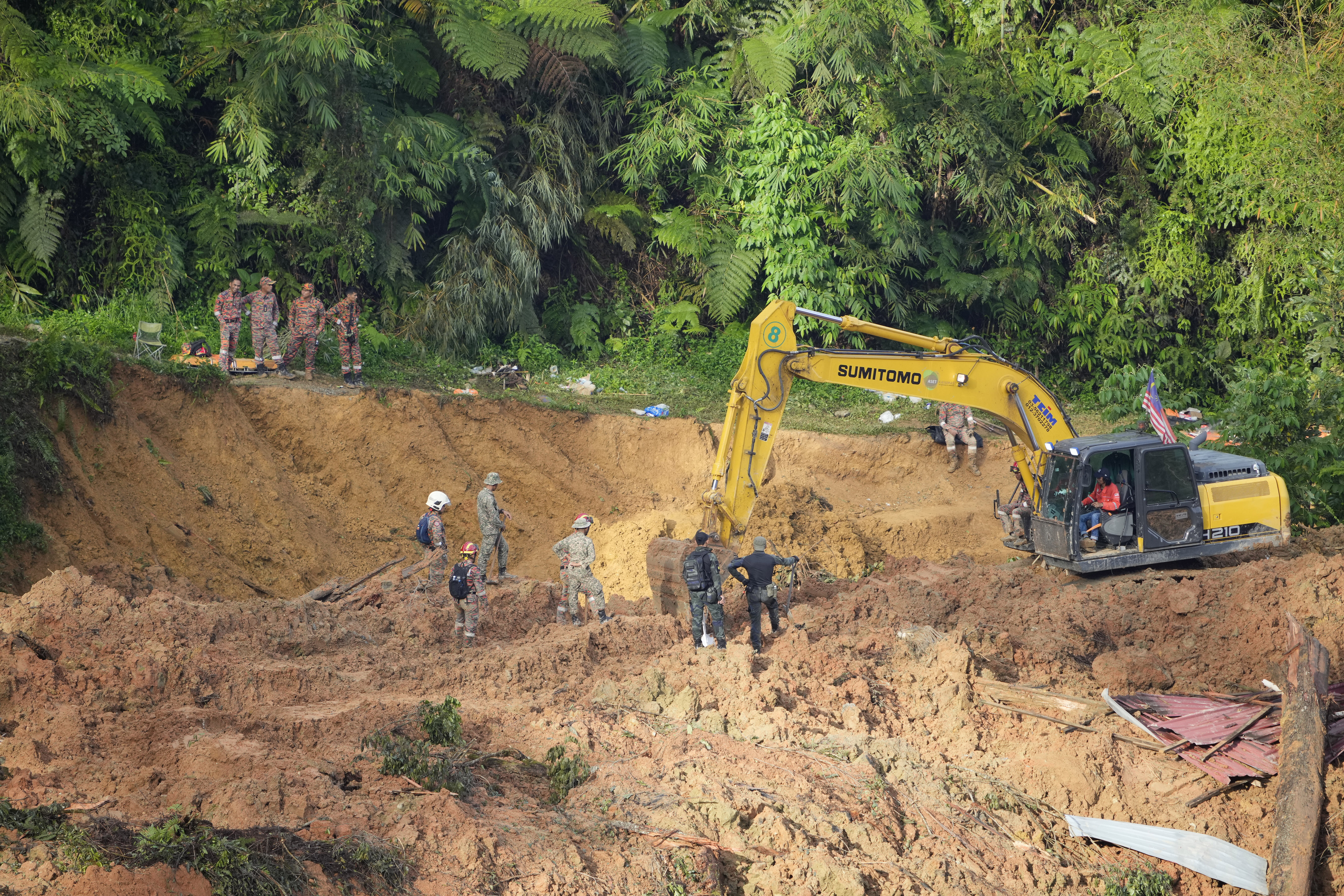 21 dead, 12 missing after landslide at Malaysia campsite – National | 24CA News