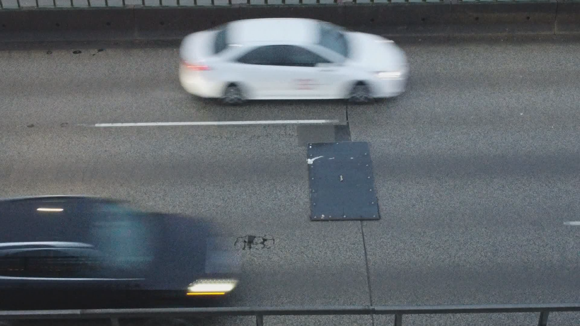 A pothole on the Ironworkers Memorial Bridge is currently covered by a metal plate.