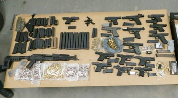 Guns allegedly seized as part of Project Touchdown. Police say it's believed most were smuggled in from the United States.