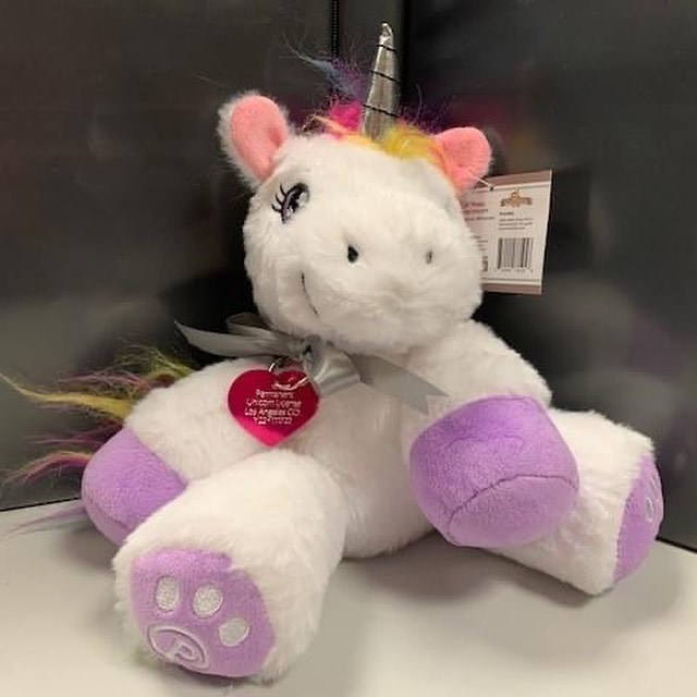 A plush unicorn sent to Madeline from the L.A. County Department of Animal Care and Control as she "continues her search" for the real deal.