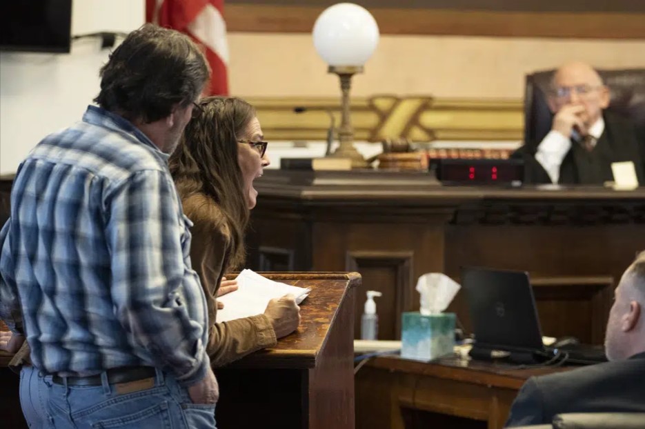 Andrea Shoemaker, mother of victim Hannah Hazel Gilley, reads her victim impact statement to defendant George Wagner IV at a hearing Monday, Dec. 19, 2022, in Waverly, Ohio. Wagner who was convicted in the killings of eight members of an Ohio family was sentenced Monday to life in prison without the possibility of parole. Wagner denied any knowledge of his family’s involvement in the 2016 shootings of seven adults and a teenager from the Rhoden family.