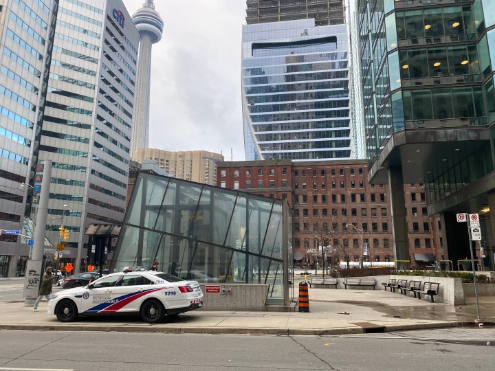 Police at the scene of a fatal "swarming" stabbing of a homeless man in downtown Toronto on Dec. 17, 2022.