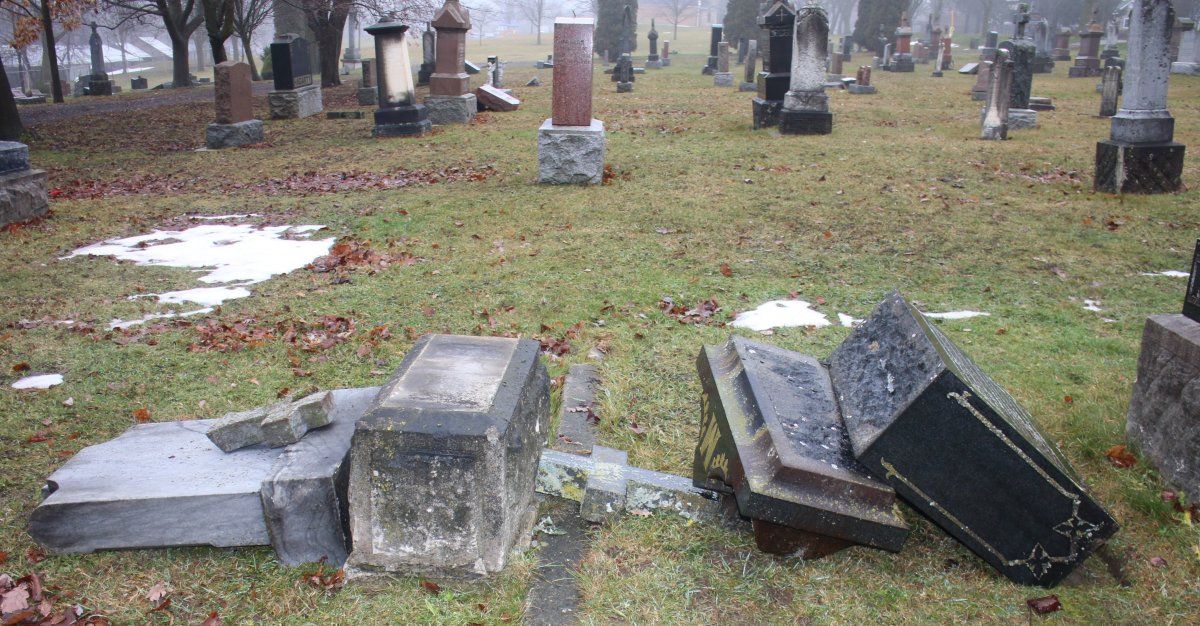 A sample of the damage done to 61 headstones at St. Vincent de Paul Cemetery in Mitchell last week.