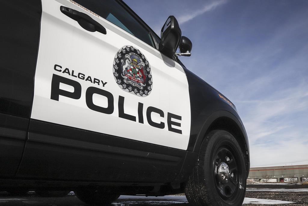 Police vehicles at Calgary Police Service headquarters on Thursday, April 9, 2020. 