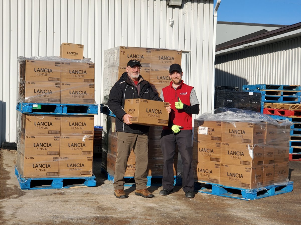 Barilla representatives donated 2,000 pounds of pasta to the Partners in Mission food bank in Kingston, Ont.