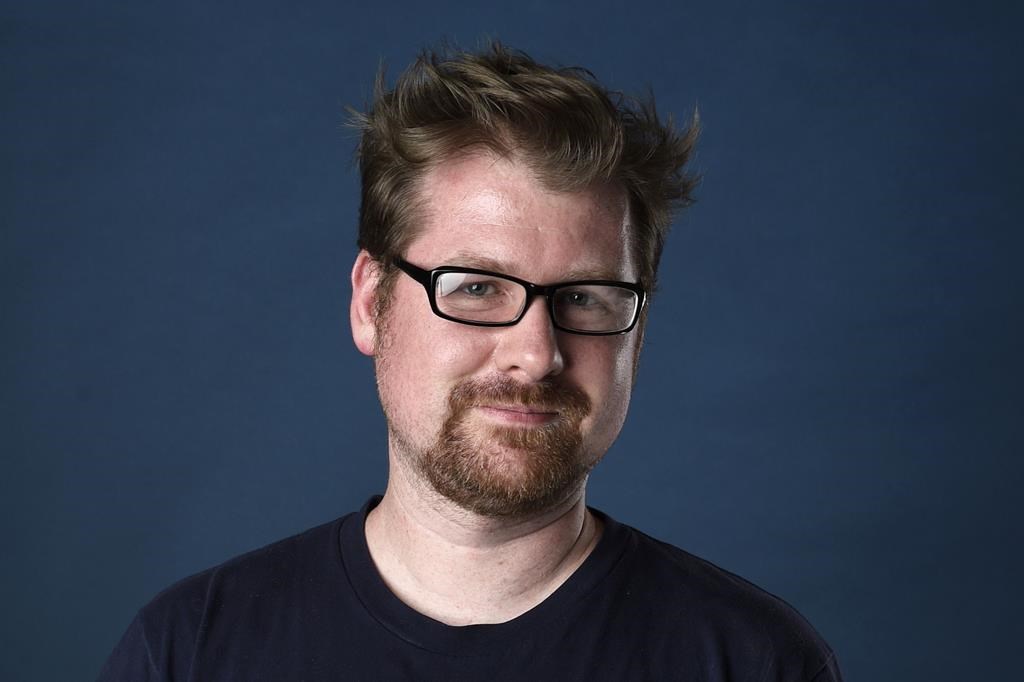 FILE - Justin Roiland poses for a portrait to promote the television series "Rick and Morty" on day two of Comic-Con International, July 21, 2017, in San Diego.