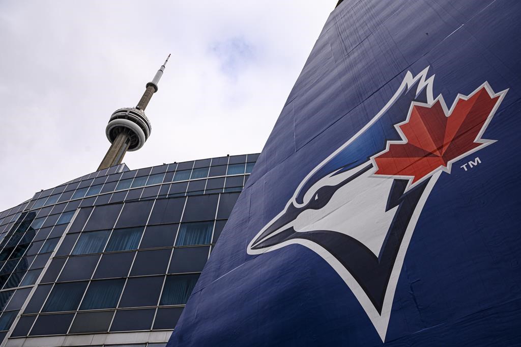 The Blue Jays logo is pictured ahead of MLB baseball action in Toronto on Wednesday, April 27, 2022. The Toronto Blue Jays agreed to terms with nine international free agents on Monday. Eight of the players are from Venezuela and one is from Brazil. THE CANADIAN PRESS/Christopher Katsarov.