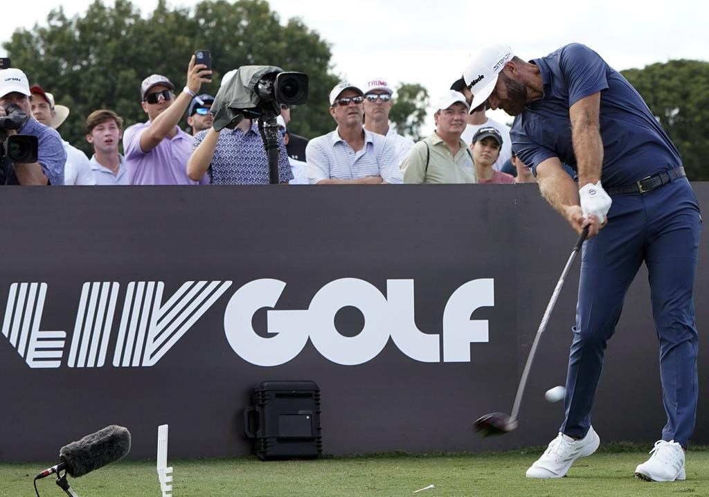 Dustin Johnson hits from the third tee during the second round of the LIV Golf Team Championship at Trump National Doral Golf Club, Oct. 29, 2022, in Doral, Fla.