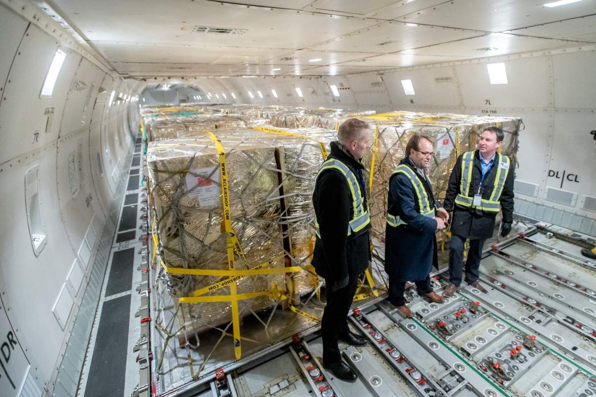 Deputy Premier Nathan Neudorf, Myron Keehn, CEO of Edmonton International Airport and Minister of Health Jason Copping meet the flight carrying the first shipment of children’s pain medication at the Edmonton International Airport on January 18, 2023.