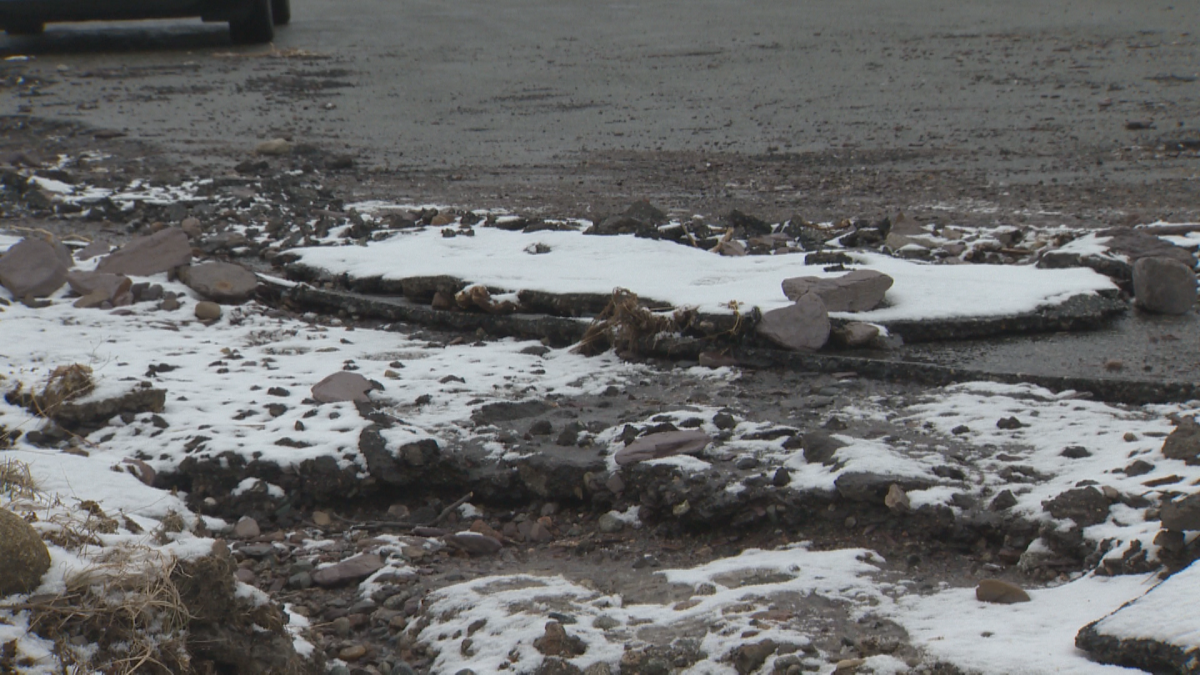 At the end of Anthony’s Cove Road in Saint John, a slab of asphalt has been ripped from the road.