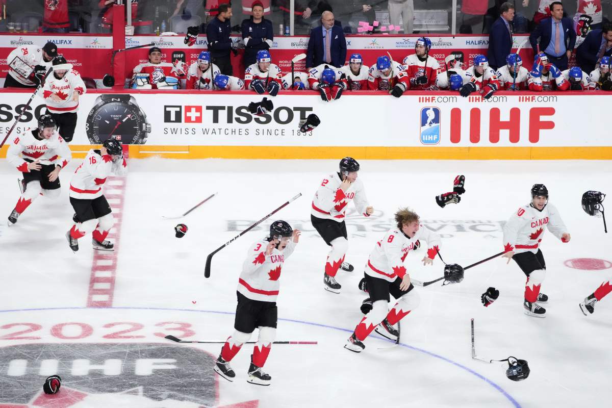 Team Canada celebrates winning the gold medal over Czechia during overtime of the IIHF World Junior Hockey Championship gold medal game in Halifax on Thursday, January 5, 2023. THE CANADIAN PRESS/Darren Calabrese