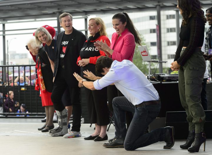 Liberal Leader Justin Trudeau bows to Hazel McCallion, left, as he attends “She The North” rally for Canadian tennis champion, Bianca Andreescu in Mississauga, Ont., on Sunday, Sept. 15, 2019.