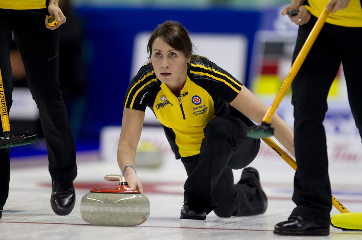 Andrea Kelly makes a shot during the morning draw against Quebec at the Scotties Tournament of Hearts in Red Deer, Alberta, Sunday, Feb. 19, 2012.