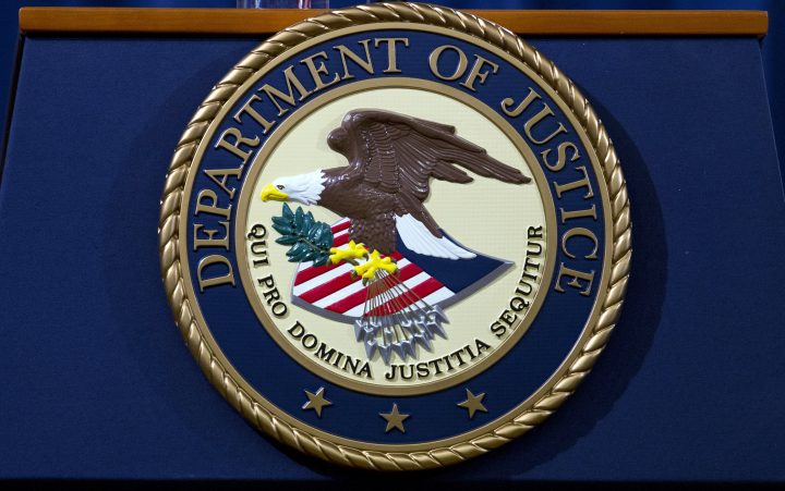 The Department of Justice seal is seen in Washington, Nov. 28, 2018.