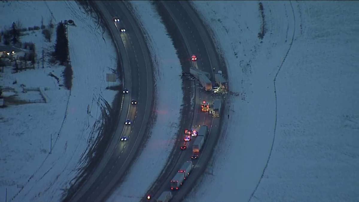Emergency crews at the scene of a fatal crash involving what appears to be three semi and one car on Jan. 20, 2023.