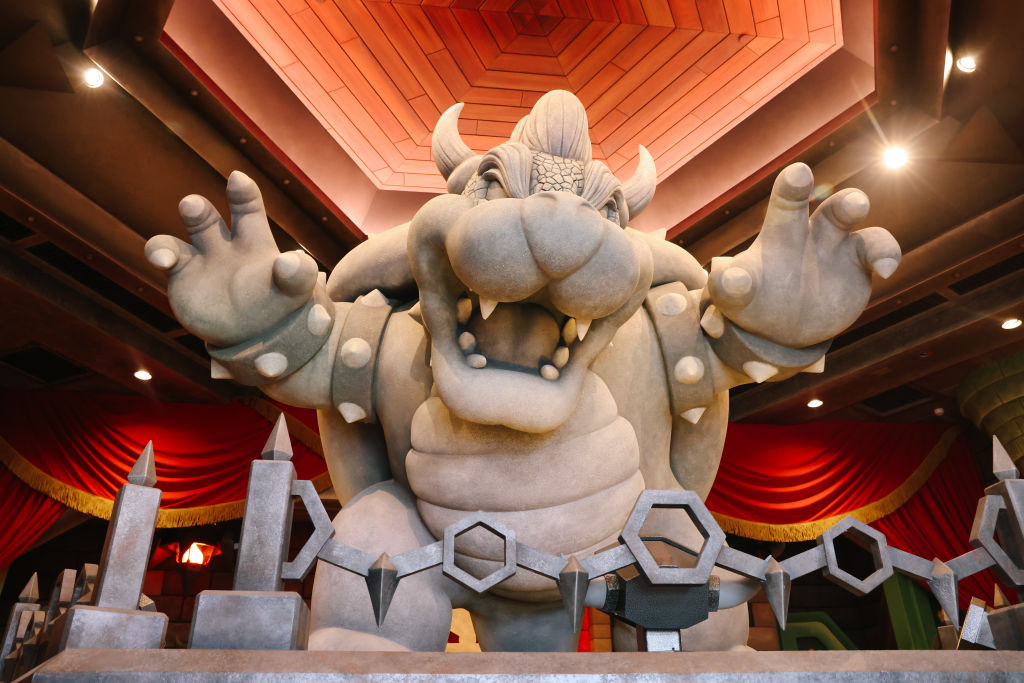 A large Bowser is seen inside a recreation of his castle at the first-ever theme park land themed to a video game franchise at Universal Studios Hollywood's Super Nintendo World on Monday, Dec. 19, 2022 in Los Angeles, CA.