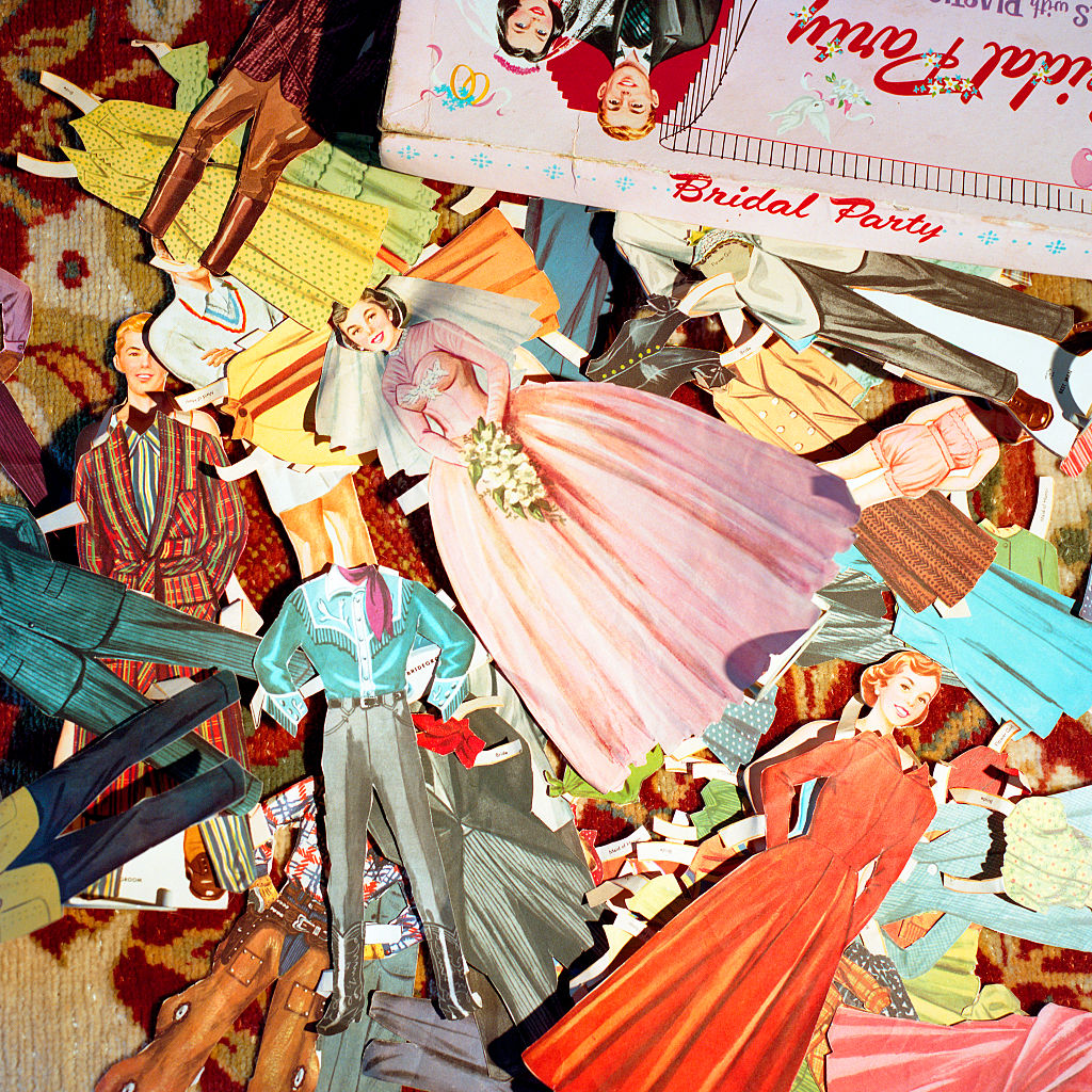 a photo of vintage paper dolls.