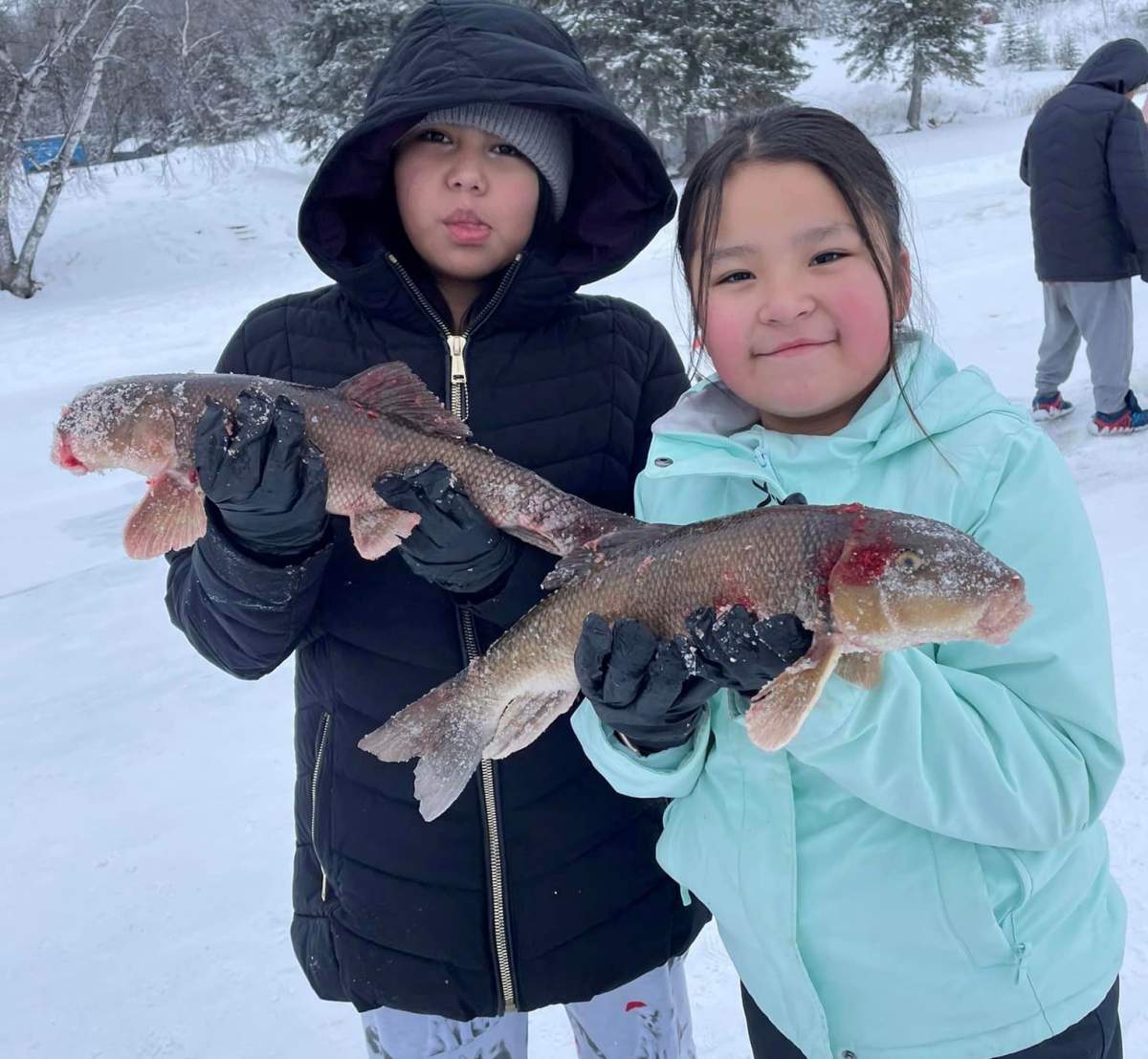 Land-based educator in Sask. school introduces students to ice fishing - image