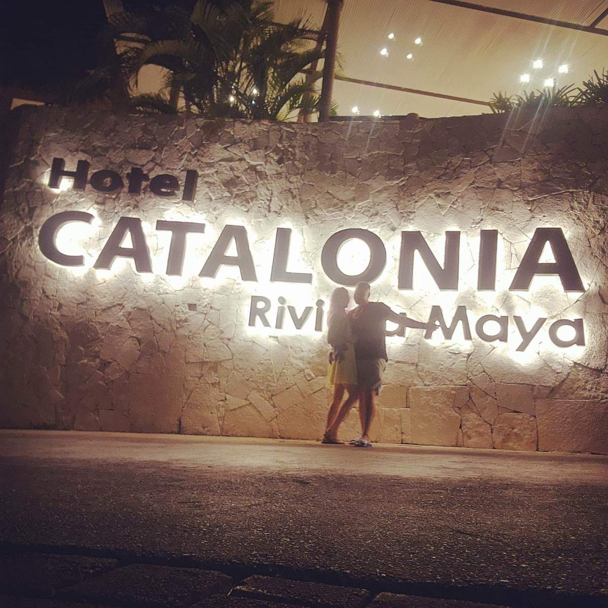 Jesse and Stacey Ropos in front of their Mexican resort.