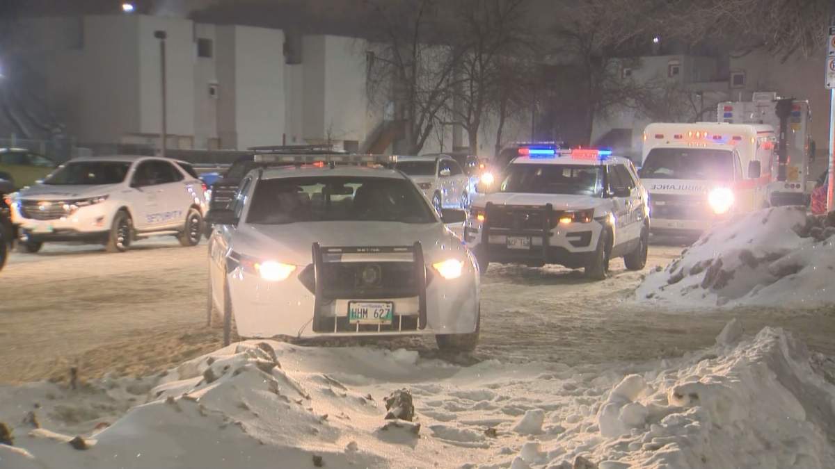 Winnipeg police at the scene of a standoff Thursday.