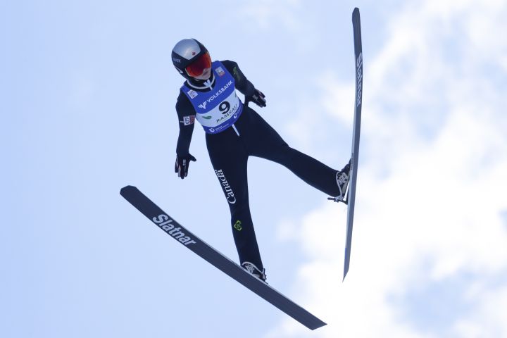Alexandria Loutitt of Canada soars through the air during the FIS Ski Jumping Women's World Cup in Ramsau, Austria, Friday, Dec. 17, 2021. 