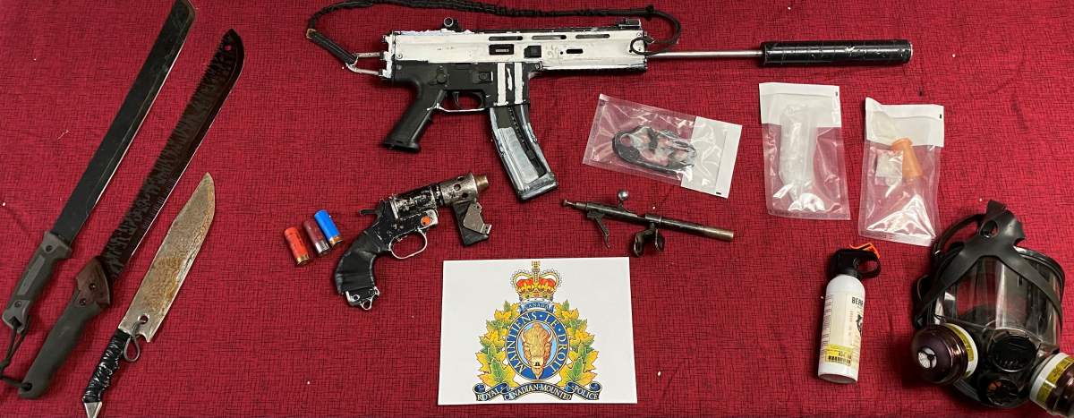 Items seized from a vehicle during a traffic stop in Colinton, Alta. on Thursday, Dec. 29, 2022.