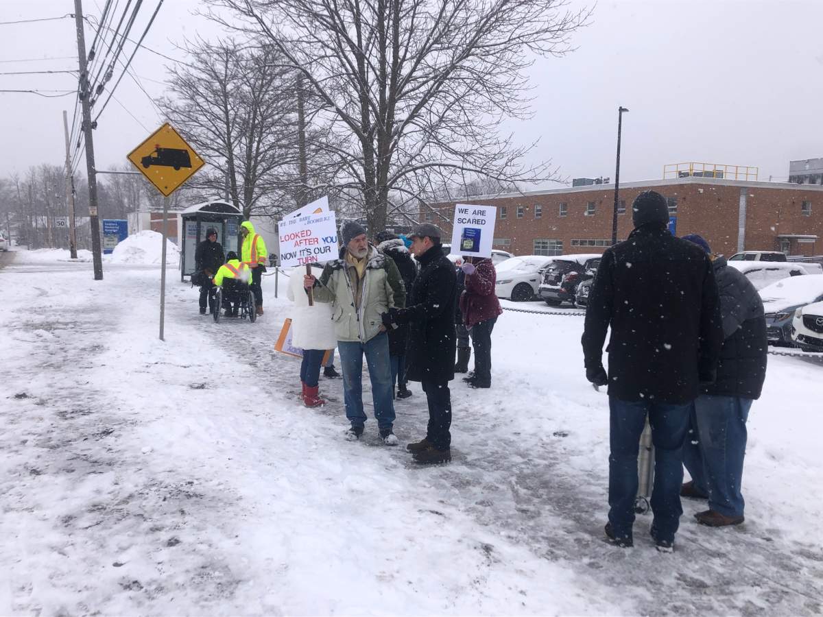 Liberal leader Zach Churchill speaks to Middleton-area residents who are worried about the future of emergency care in their community.